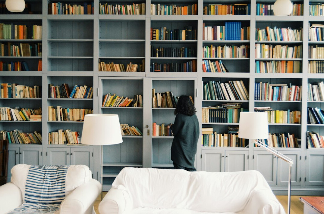 Library with tall shelves and a long reading hall