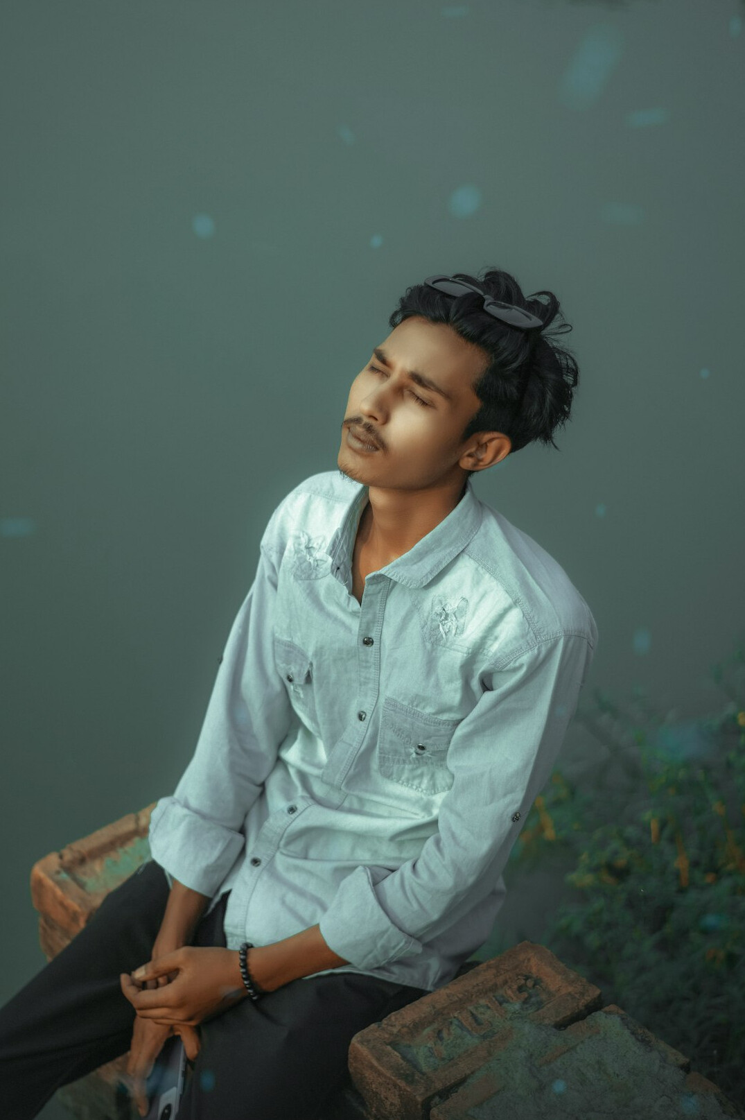 Portrait of a man in a shirt with a calm expression