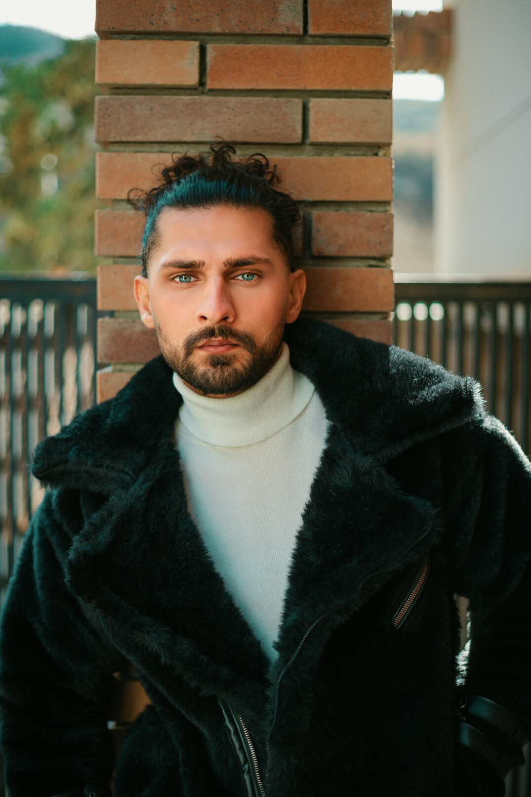 Portrait of a bearded Latino man looking at the camera