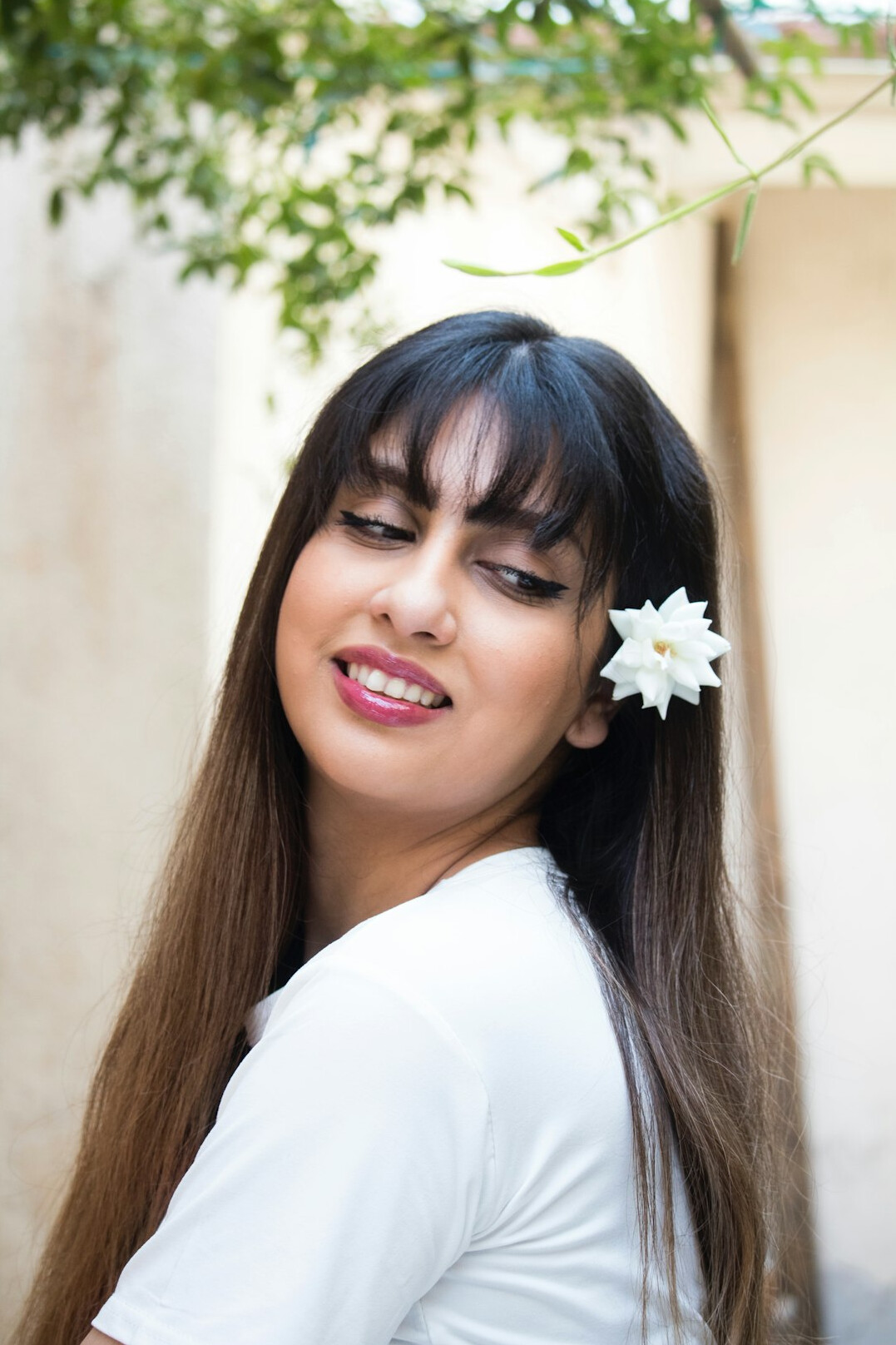 Portrait of a smiling woman with long hair