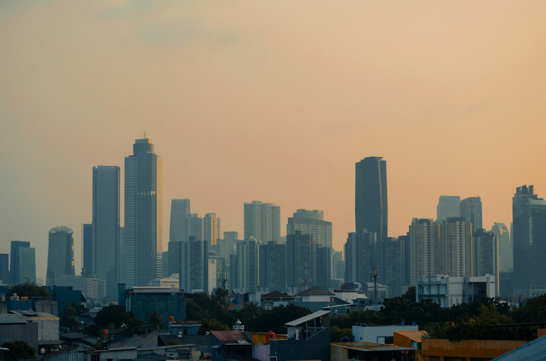 City skyline at dusk with warm light